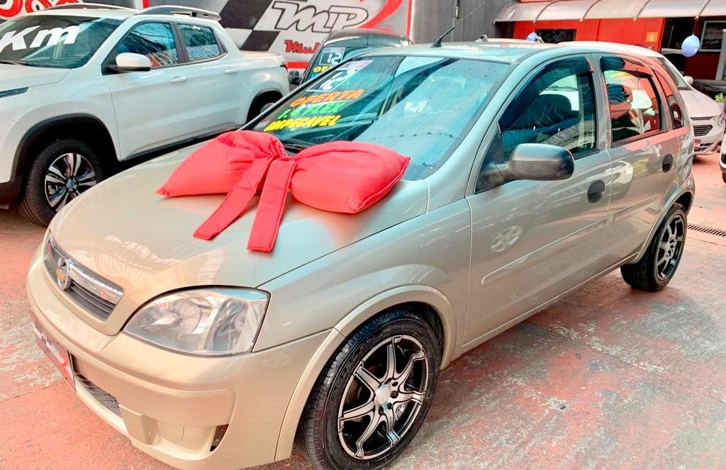 Chevrolet Corsa Hatch 1.4 Mpfi Maxx 8v Flex 4p Manual Dourado Flex 2012  Usado - Interior Carro